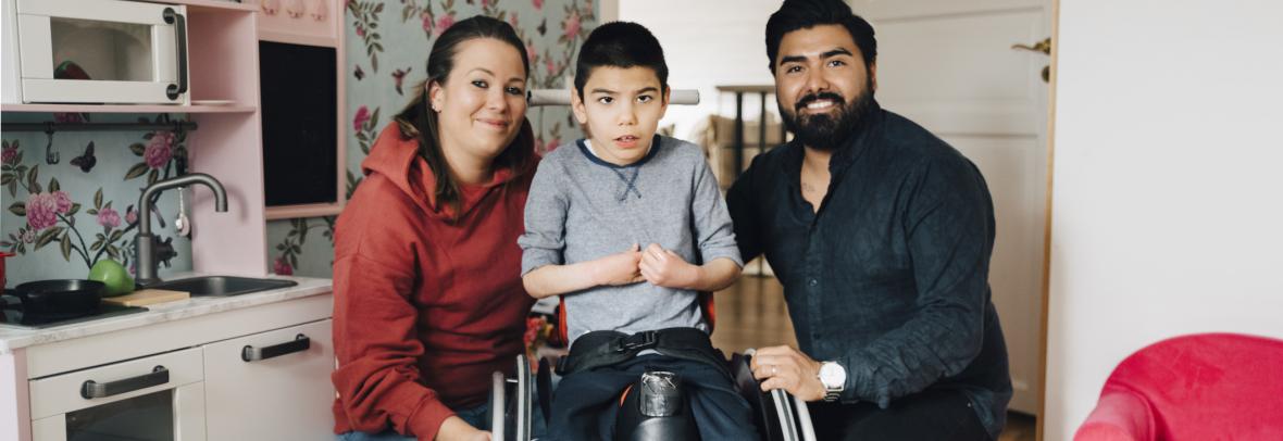 Playroom with Mom, Dad and child in a wheelchair