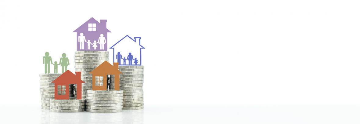 Home and family cutouts sit on top of coins stacked at different heights