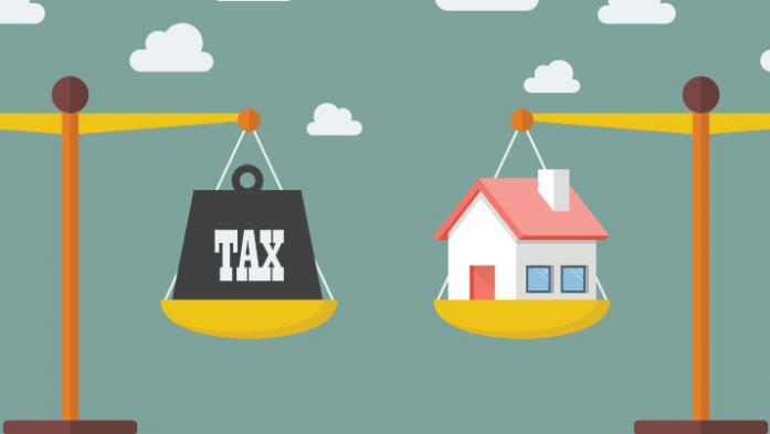 illustration of scale with house on one side and tax on the other