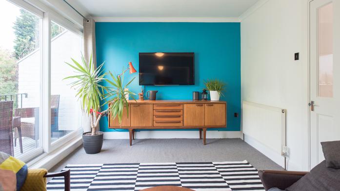 Beautifully decorated living room with mid century modern furniture