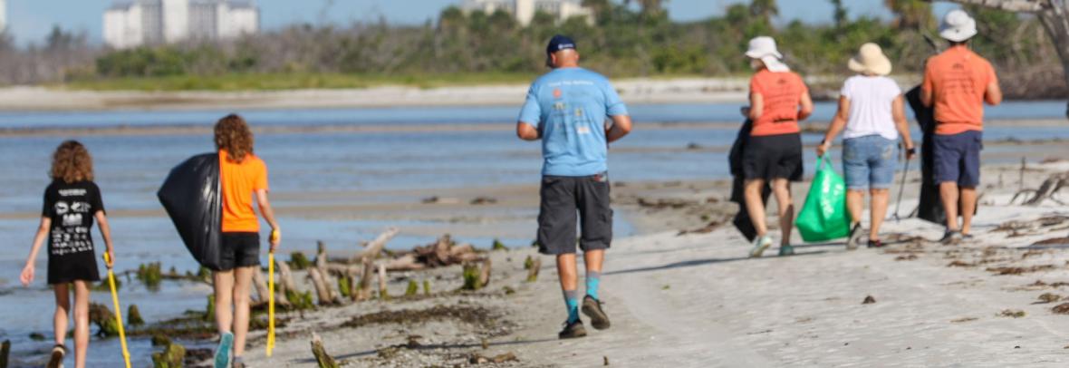 A group of volunteers cleaning waterways during Clean Up Florida Waters 2025 event 
