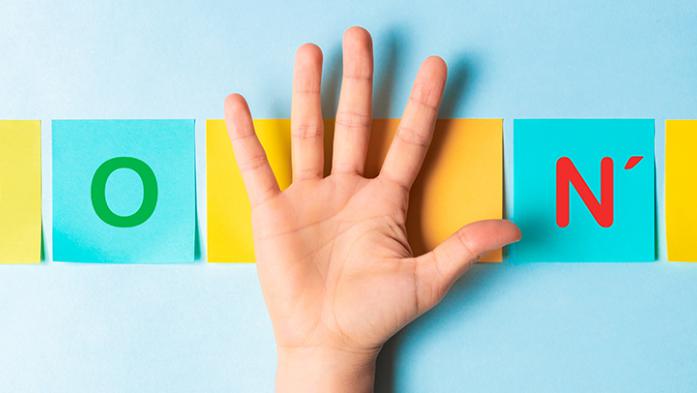 Photo illustration of a hand that divides the words Do and Don't