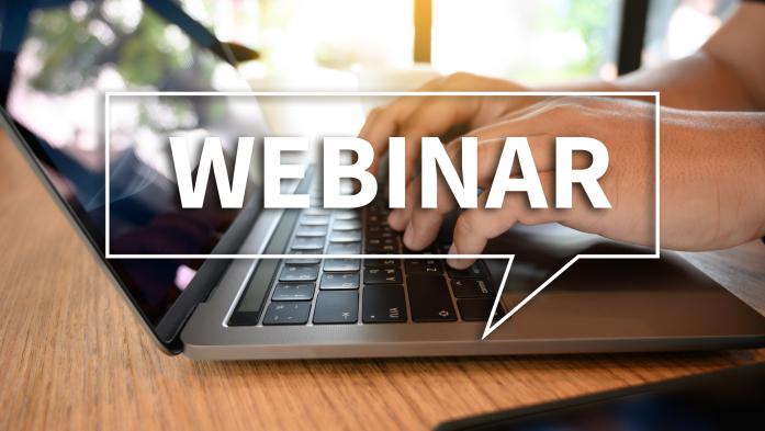 webinar hands typing on laptop